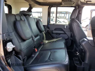 2021 Jeep Wrangler Unlimited Sahara with VIN 1C4JJXP69MW800920, listed as a Copart auction lot 52033745 with 49,173 mi miles and Salvage Title. Bid and sale history available at DreamBid. Image 11.