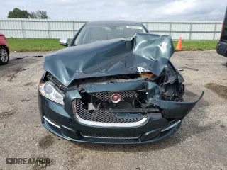 2014 Jaguar XJ with VIN SAJWJ2GD4E8V70170, listed as a Copart auction lot 69662054 with 121,188 mi miles and Non Repairable. Bid and sale history available at carsss.com. Image 5.