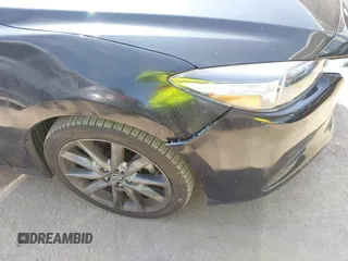 2018 Mazda 3 Touring z VIN 3MZBN1V33JM276803, wystawiony jako IAAI lot #42100422 z przebiegiem 41 802 mil mil oraz . Historia ofert i sprzedaży dostępna na DreamBid. Obrazek 17.