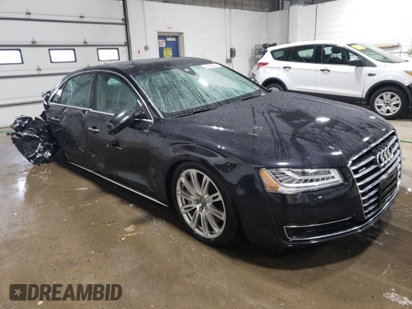 2015 Audi A8 4.0T z VIN WAU32AFD0FN017865, wystawiony jako Copart lot #37065594 z przebiegiem 55 632 mil mil oraz Szkoda całkowita • Salvage title. Historia ofert i sprzedaży dostępna na DreamBid. Obrazek 4.
