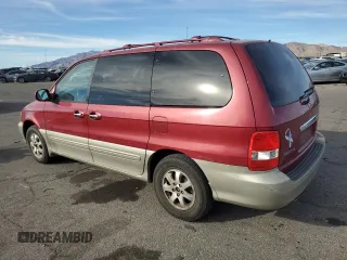 2004 Kia Sedona LX with VIN KNDUP131546612432, listed as a Copart auction lot 87326764 with 156,259 mi miles and Salvage Title. Bid and sale history available at carsss.com. Image 2.