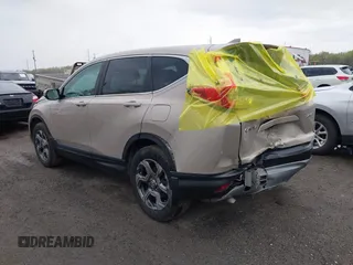 2018 Honda CR-V EX-L with VIN 5J6RW2H81JL025818, listed as a IAAI auction lot 42038457 with 102,579 mi miles. Bid and sale history available at carsss.com. Image 3.