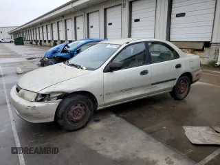 1998 Mazda Protege DX z VIN JM1BC1412W0206034, wystawiony jako Copart lot #58803775 z przebiegiem 185 143 mil mil oraz Szkoda całkowita • Salvage title. Historia ofert i sprzedaży dostępna na DreamBid. Obrazek 1.