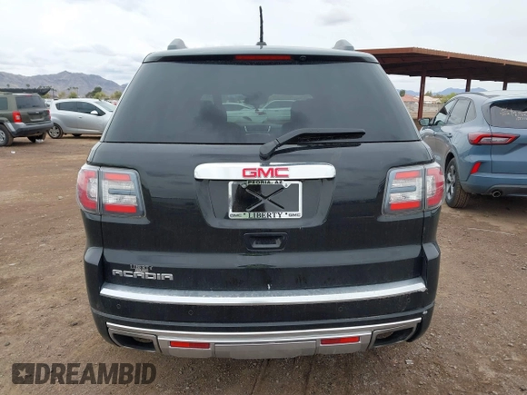 2016 GMC Acadia Denali with VIN 1GKKRTKD0GJ217329, listed as a IAAI auction lot 41762055 with 64,447 mi miles. Bid and sale history available at carsss.com. Image 16.