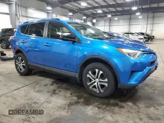 2017 Toyota RAV4 LE with VIN JTMBFREV8HJ141257, listed as a Copart auction lot 54527785 with 125,423 mi miles and Salvage Title. Bid and sale history available at DreamBid. Image 4.