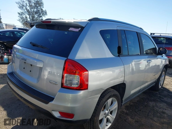 2011 Jeep Compass with VIN 1J4NT1FA4BD139153, listed as a IAAI auction lot 41665481 with 164,412 mi miles. Bid and sale history available at carsss.com. Image 4.