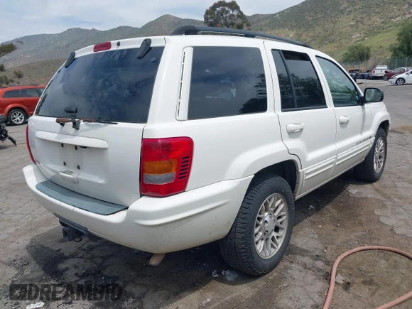 2002 Jeep Grand Cherokee Limited with VIN 1J4GX58S52C305020, listed as a IAAI auction lot 42025324 with 214,214 mi miles and . Bid and sale history available at DreamBid. Image 4.