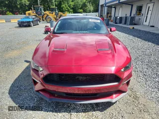 2019 Ford Mustang EcoBoost z VIN 1FA6P8TH0K5167704, wystawiony jako Copart lot #59506005 z przebiegiem 65 204 mil mil oraz Szkoda całkowita • Salvage title. Historia ofert i sprzedaży dostępna na DreamBid. Obrazek 5.