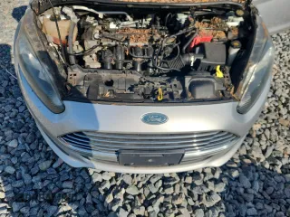 2015 Ford Fiesta S z VIN 3FADP4TJ4FM107573, wystawiony jako Copart lot #62332395 z przebiegiem Nie podano mil oraz Czysty tytuł • Clean title. Historia ofert i sprzedaży dostępna na DreamBid. Obrazek 11.
