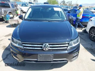 2021 Volkswagen Tiguan SE with VIN 3VV3B7AX1MM045478, listed as a IAAI auction lot 41947899 with 56,694 mi miles and . Bid and sale history available at DreamBid. Image 12.