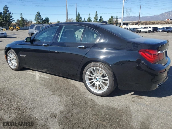 2014 BMW 7 Series 750i with VIN WBAYA8C5XED228235, listed as a Copart auction lot 85604144 with 0 mi miles and Salvage Title. Bid and sale history available at carsss.com. Image 2.