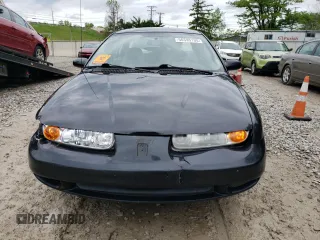 2002 Saturn SL z VIN 1G8ZH52842Z201392, wystawiony jako Copart lot #56595105 z przebiegiem Nie podano mil oraz Szkoda całkowita • Salvage title. Historia ofert i sprzedaży dostępna na DreamBid. Obrazek 5.