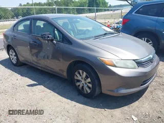 2012 Honda Civic LX z VIN 19XFB2F52CE076933, wystawiony jako IAAI lot #42149375 z przebiegiem 155 496 mil mil oraz . Historia ofert i sprzedaży dostępna na DreamBid. Obrazek 1.