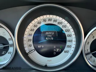 2015 Mercedes-Benz E-Class E 400 with VIN WDDKJ6FB2FF307294, listed as a Copart auction lot 77882794 with 82,173 mi miles and Salvage Title. Bid and sale history available at carsss.com. Image 8.