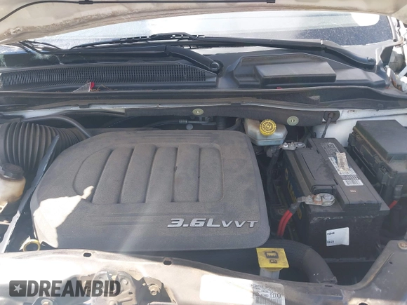 2015 Dodge Grand Caravan SE with VIN 2C4RDGBG6FR613981, listed as a IAAI auction lot 42043348 with 87,615 mi miles and . Bid and sale history available at DreamBid. Image 10.