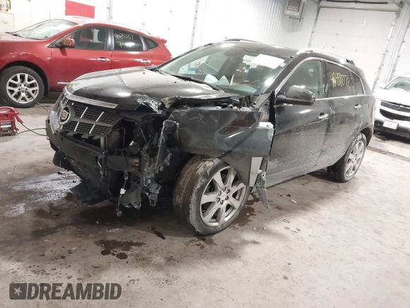 2011 Cadillac SRX Performance Collection with VIN 3GYFNEEY9BS533994, listed as a IAAI auction lot 40990072 with 168,134 mi miles. Bid and sale history available at carsss.com. Image 18.