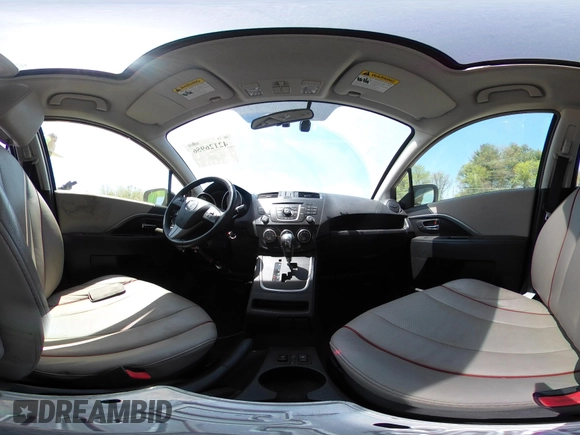 2012 Mazda 5 Grand Touring with VIN JM1CW2DL1C0123418, listed as a IAAI auction lot 42126956 with 112,411 mi miles and . Bid and sale history available at DreamBid. Image 23.
