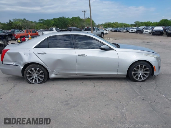 2016 Cadillac CTS with VIN 1G6AR5SS9G0194126, listed as a IAAI auction lot 41972437 with 129,742 mi miles and . Bid and sale history available at DreamBid. Image 13.