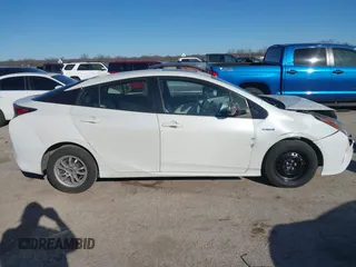 2017 Toyota Prius Two z VIN JTDKARFU9H3043444, wystawiony jako IAAI lot #41729481 z przebiegiem 148 706 mil mil oraz . Historia ofert i sprzedaży dostępna na DreamBid. Obrazek 13.