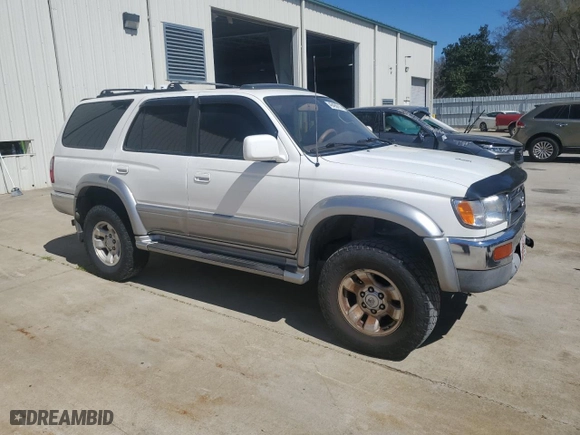1998 Toyota 4Runner with VIN JT3GN87R6W0082865, listed as a Copart auction lot 49490015 with 411,722 mi miles and Salvage Title. Bid and sale history available at carsss.com. Image 4.