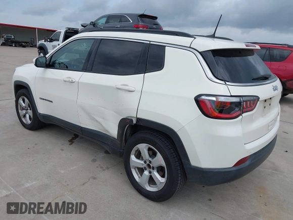 2019 Jeep Compass Latitude with VIN 3C4NJCBB9KT652088, listed as a IAAI auction lot 42162439 with 97,276 mi miles and . Bid and sale history available at DreamBid. Image 3.