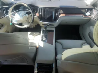2020 Volvo V60 z VIN YV4102WKXL1031888, wystawiony jako Copart lot #47873925 z przebiegiem 59 799 mil mil oraz Szkody całkowita. Historia ofert i sprzedaży dostępna na DreamBid. Obrazek 8.