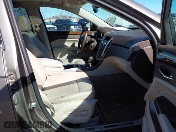 2012 Cadillac SRX Luxury Collection with VIN 3GYFNAE35CS549902, listed as a IAAI auction lot 41575145 with 201,054 mi miles and . Bid and sale history available at carsss.com. Image 5.