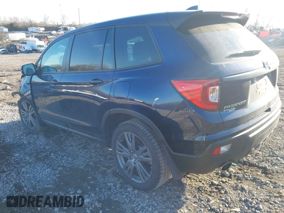 2019 Honda Passport EX-L with VIN 5FNYF7H50KB012132, listed as a IAAI auction lot 41327682 with 56,653 mi miles and . Bid and sale history available at carsss.com. Image 3.