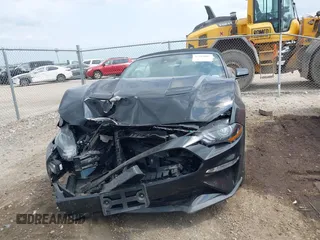 2021 Ford Mustang EcoBoost z VIN 1FATP8UH2M5120226, wystawiony jako IAAI lot #42164009 z przebiegiem 85 571 mil mil oraz . Historia ofert i sprzedaży dostępna na DreamBid. Obrazek 13.