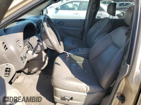 2001 Chrysler Town & Country LXi with VIN 2C8GT54L31R100381, listed as a Copart auction lot 72474224 with 246,308 mi miles and Salvage Title. Bid and sale history available at DreamBid. Image 7.