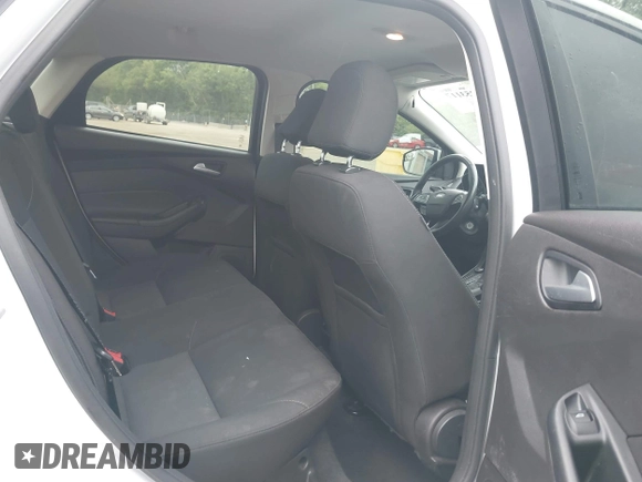 2016 Ford Focus SE with VIN 1FADP3F21GL288553, listed as a IAAI auction lot 42253117 with 107,727 mi miles and . Bid and sale history available at DreamBid. Image 8.