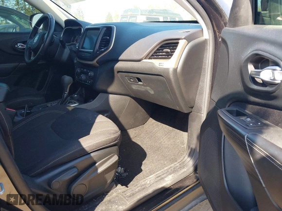2015 Jeep Cherokee North with VIN 1C4PJMCS3FW777973, listed as a IAAI auction lot 42043203 with 158,536 mi miles. Bid and sale history available at carsss.com. Image 5.