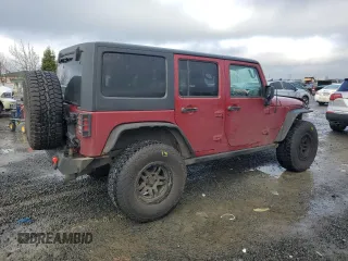 2012 Jeep Wrangler Unlimited Rubicon with VIN 1C4HJWFG2CL219021, listed as a Copart auction lot 87451784 with 109,675 mi miles and Salvage title. Bid and sale history available at DreamBid. Image 3.