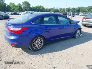 2014 Ford Focus Titanium with VIN 1FADP3J26EL179266, listed as a IAAI auction lot 42712701 with 157,897 mi miles and . Bid and sale history available at DreamBid. Image 4.