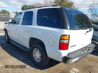 2005 GMC Yukon SLT with VIN 1GKEC13VX5J133090, listed as a IAAI auction lot 41281908 with 108,598 mi miles. Bid and sale history available at carsss.com. Image 3.
