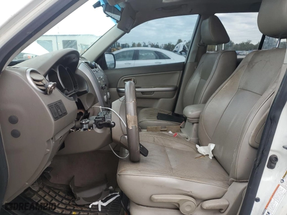 2011 Suzuki Grand Vitara Limited with VIN JS3TE0D73B4100502, listed as a Copart auction lot 77589524 with 195,572 mi miles and Salvage Title. Bid and sale history available at carsss.com. Image 7.