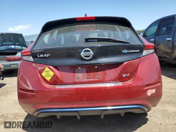 2018 Nissan LEAF S with VIN 1N4AZ1CP2JC303571, listed as a Copart auction lot 55249995 with 33,009 mi miles and Salvage Title. Bid and sale history available at DreamBid. Image 6.