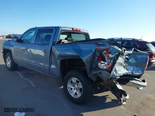 2015 Chevrolet Silverado 1500 LT with VIN 3GCUKREC5FG308790, listed as a IAAI auction lot 41879712 with 85,015 mi miles. Bid and sale history available at carsss.com. Image 3.