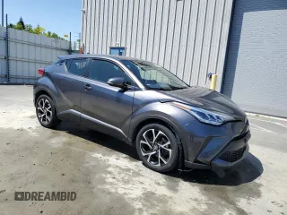2021 Toyota C-HR LE with VIN JTNKHMBX1M1115317, listed as a Copart auction lot 56200305 with 82,237 mi miles and Clean Title. Bid and sale history available at DreamBid. Image 4.