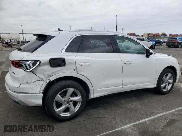 2021 Audi Q3 Premium with VIN WA1AUCF39M1061658, listed as a Copart auction lot 50717875 with 87,363 mi miles and Salvage title. Bid and sale history available at DreamBid. Image 3.
