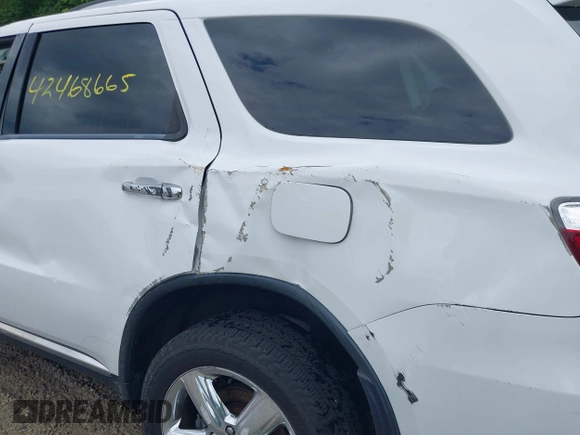 2013 Dodge Durango Citadel with VIN 1C4RDJEGXDC559700, listed as a IAAI auction lot 42468665 with 138,967 mi miles and . Bid and sale history available at DreamBid. Image 15.