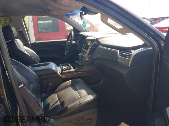 2015 Chevrolet Tahoe LTZ z VIN 1GNSKCKC8FR141163, wystawiony jako IAAI lot #42114008 z przebiegiem 221 804 mil mil oraz . Historia ofert i sprzedaży dostępna na DreamBid. Obrazek 5.