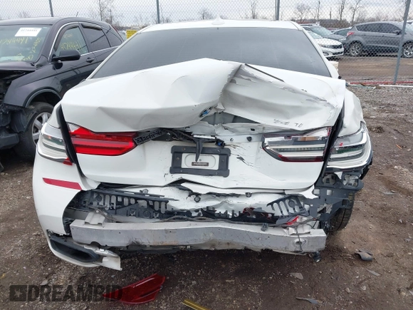 2016 BMW 7 Series 740i with VIN WBA7E2C50GG714647, listed as a IAAI auction lot 41745442 with 134,399 mi miles and . Bid and sale history available at carsss.com. Image 17.