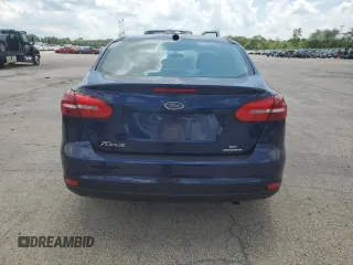 2016 Ford Focus SE z VIN 1FADP3F23GL288232, wystawiony jako Copart lot #62565095 z przebiegiem 11 634 mil mil oraz Szkoda całkowita • Salvage title. Historia ofert i sprzedaży dostępna na DreamBid. Obrazek 6.
