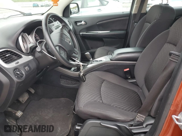 2014 Dodge Journey American Value with VIN 3C4PDCAB7ET102555, listed as a Copart auction lot 56461465 with 91,935 mi miles and Clean title. Bid and sale history available at DreamBid. Image 7.