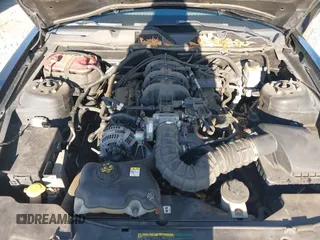 2010 Ford Mustang V6 with VIN 1ZVBP8AN0A5163231, listed as a IAAI auction lot 41876384 with 113,419 mi miles. Bid and sale history available at carsss.com. Image 10.
