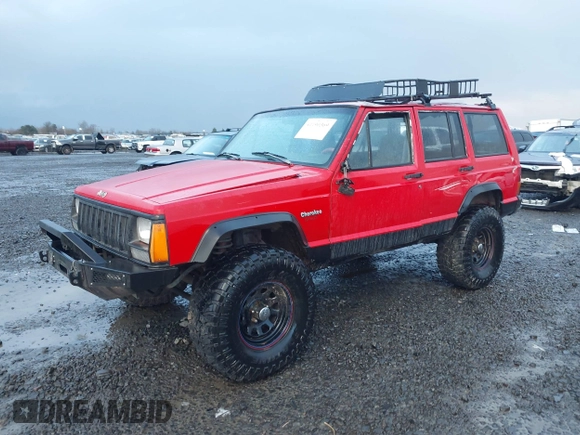 1996 Jeep Cherokee Sport with VIN 1J4FJ68S4TL244893, listed as a IAAI auction lot 41190369 with 192,459 mi miles and . Bid and sale history available at DreamBid. Image 2.