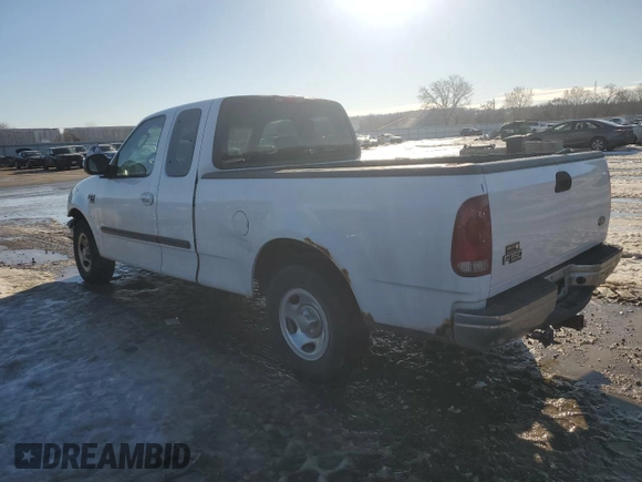 2002 Ford F-150 XL with VIN 1FTRX17L42KD35973, listed as a Copart auction lot 89121325 with 258,895 mi miles and Salvage title. Bid and sale history available at DreamBid. Image 2.