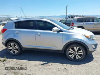 2012 Kia Sportage EX with VIN KNDPCCA24C7255785, listed as a IAAI auction lot 42620042 with 139,936 mi miles and . Bid and sale history available at DreamBid. Image 6.