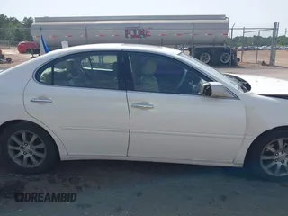 2002 Lexus ES 300 z VIN JTHBF30G920074623, wystawiony jako IAAI lot #42266066 z przebiegiem 352 081 mil mil oraz . Historia ofert i sprzedaży dostępna na DreamBid. Obrazek 13.